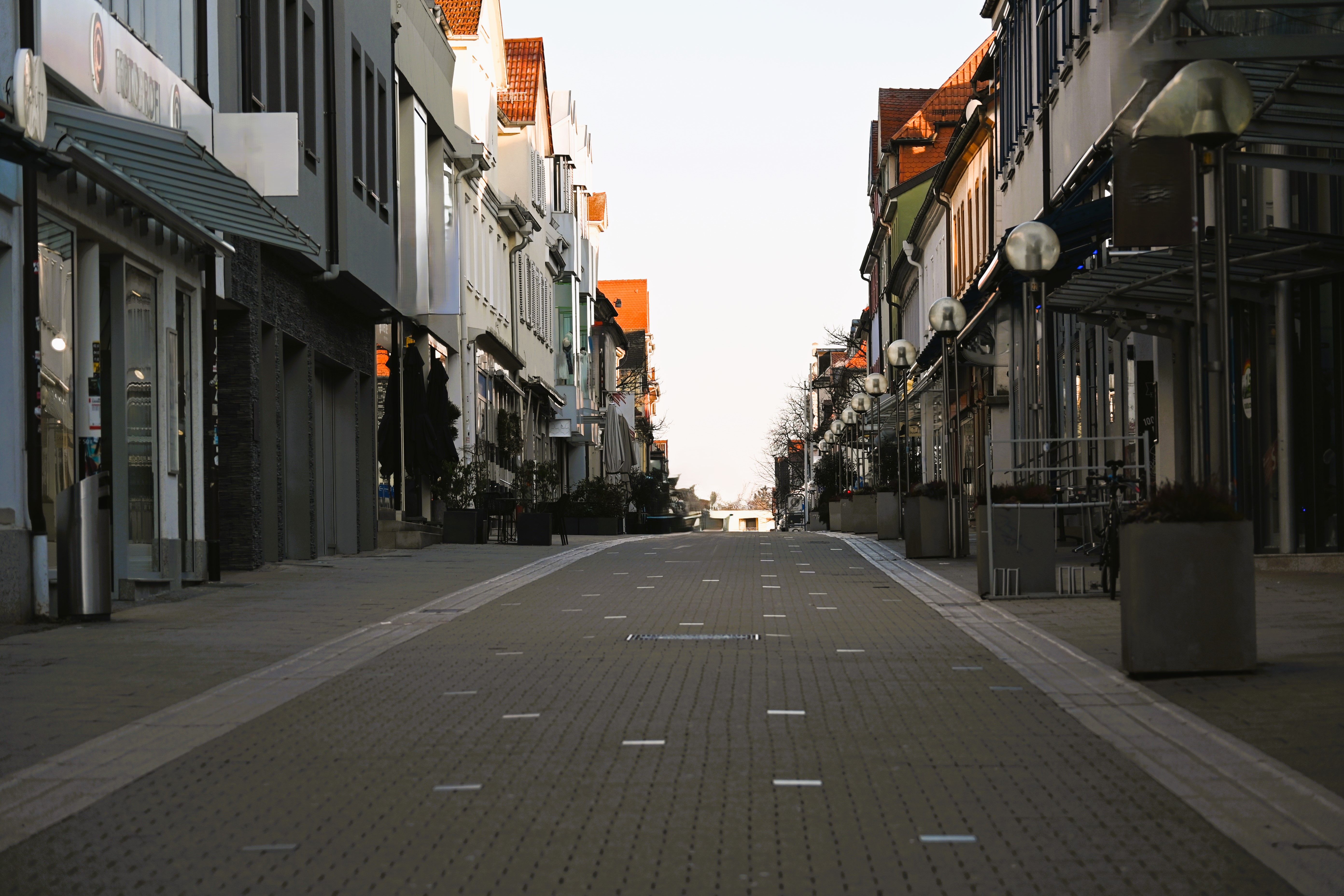 Peaceful empty street lined with buildings in Baden-Württemberg, Germany, capturing the essence of early spring.