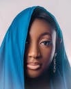 Elegant Portrait of Woman with Blue Headscarf