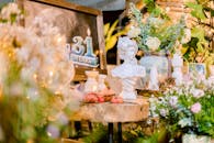 Elegant Floral Arrangement with Classical Bust