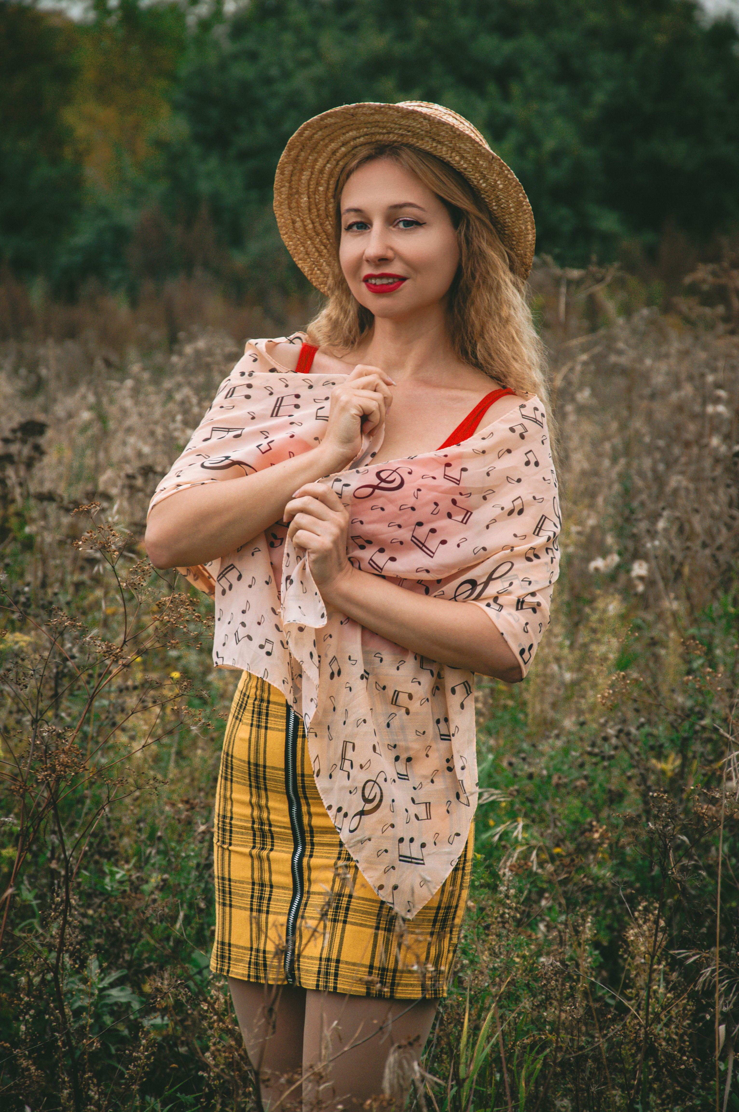 Woman in straw hat standing in meadow · Free Stock Photo