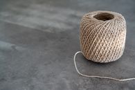 Brown Spool Of Rope on Gray Concrete Floor