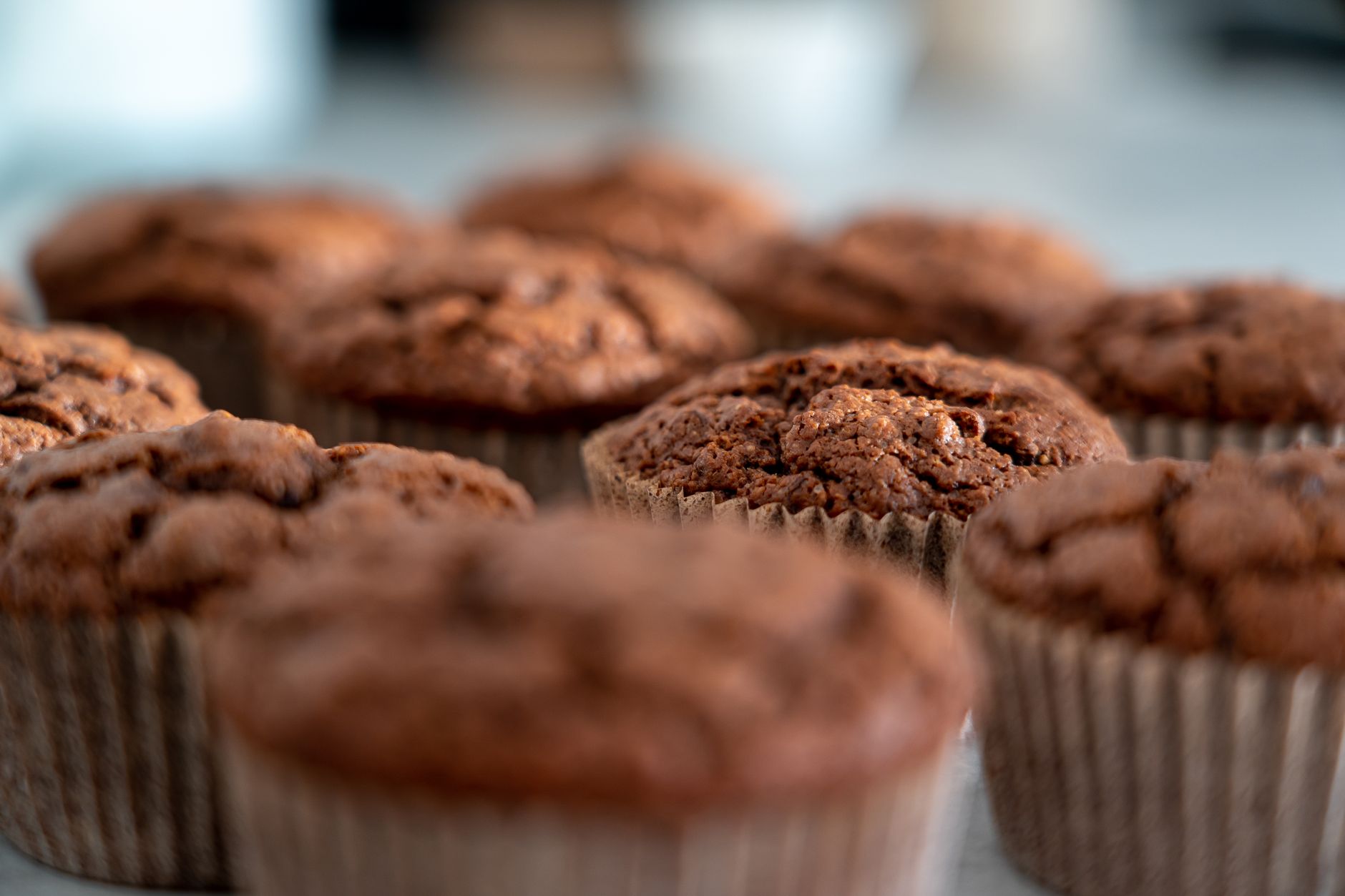 Tray of freshly baked brown butter banana muffins cooling