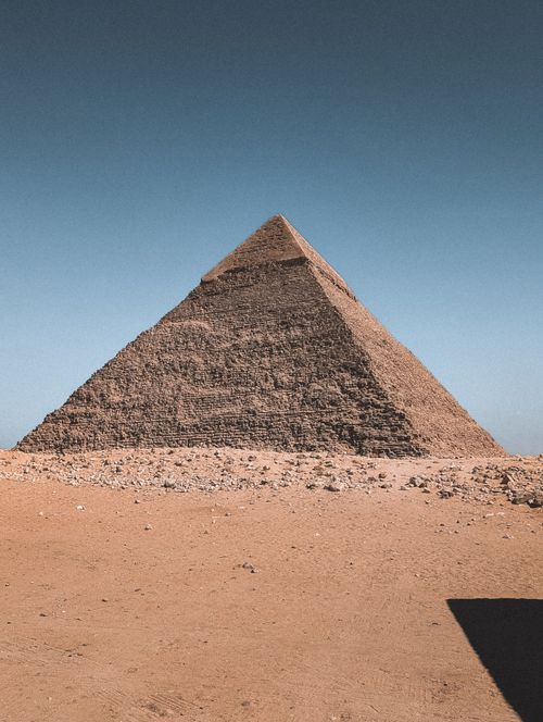 Free The iconic Great Pyramid of Giza under a clear blue sky, showcasing ancient Egyptian architecture. Stock Photo