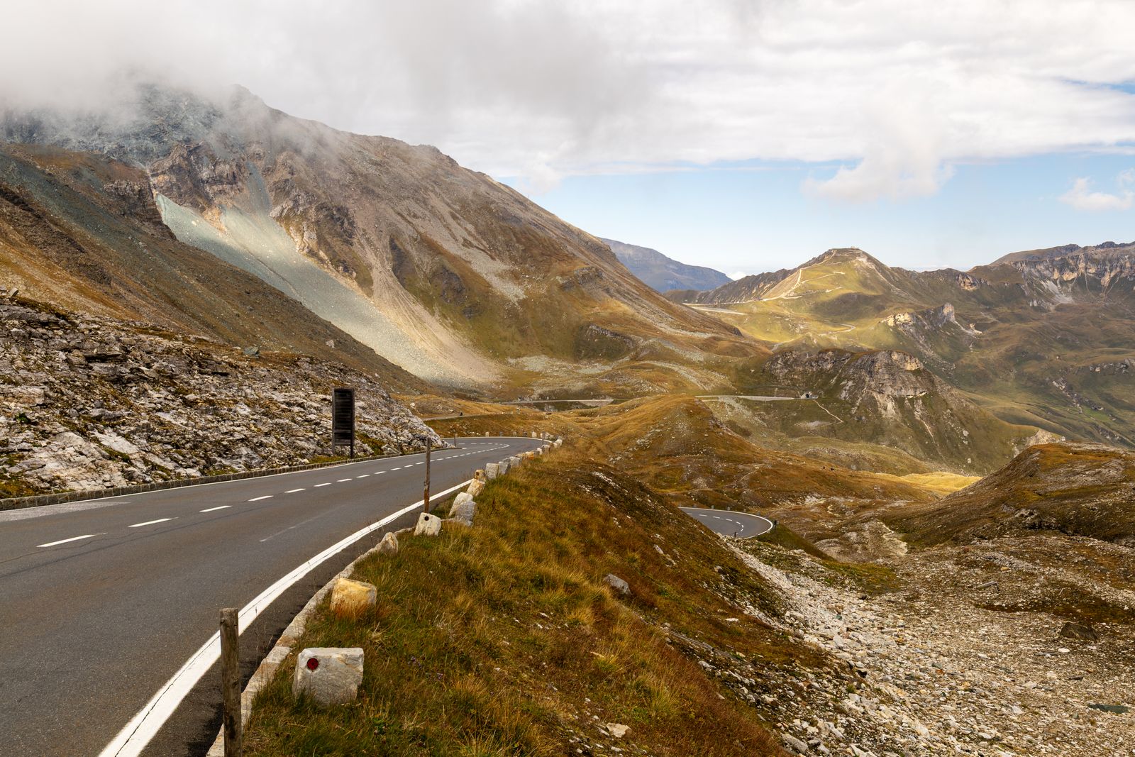 A winding stretch of the Grossglockner High Alpine Road near the Hochtor pass, framed by rugged peaks