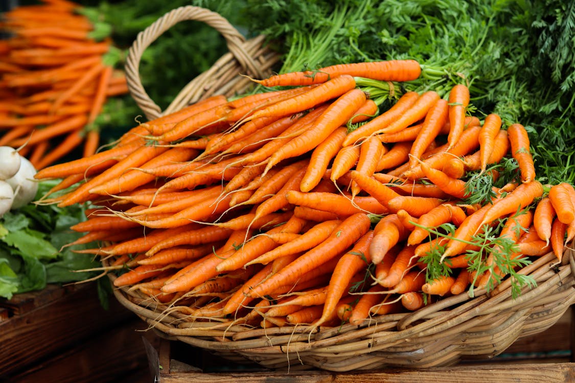 Orange Carrots on Brown Woven Basket