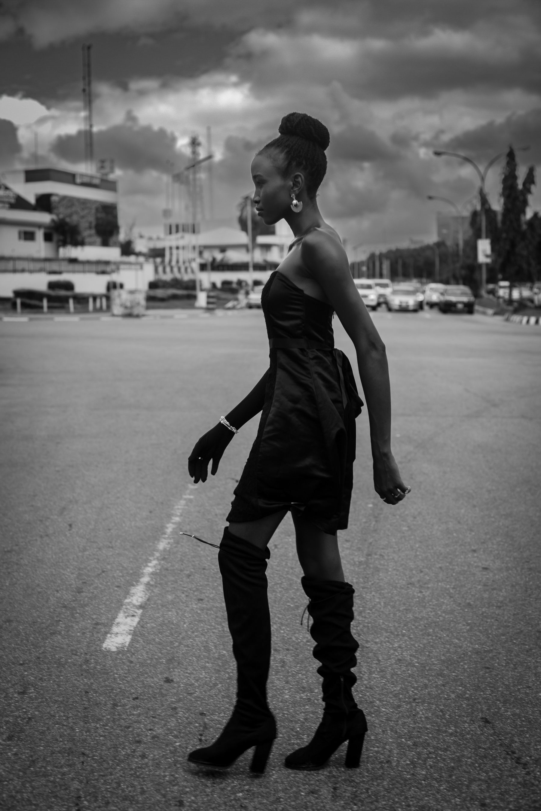 Stylish Woman Walking in Urban Nigerian Street · Free Stock Photo