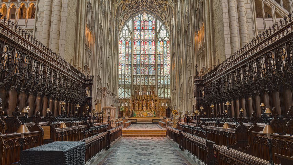 The quire and great east window inside Gloucester Cathedral, a highlight of a weekend break in Gloucester