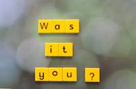Yellow Scrabble Tiles Asking 'Was it You?'