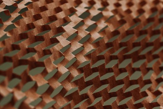 Close-up abstract view of a textured brown surface pattern.