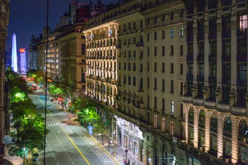 Free Explore the illuminated streets of Buenos Aires at night with a view of the Obelisk. Stock Photo