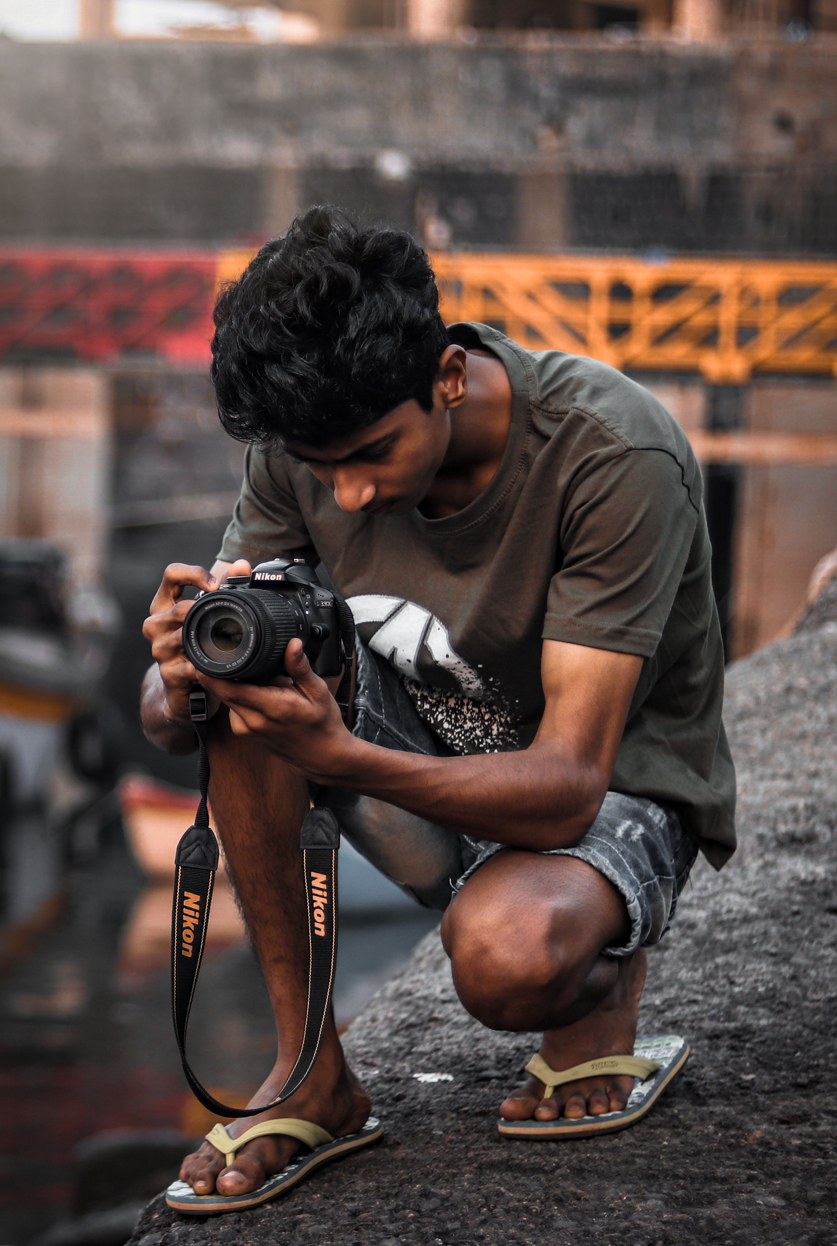 Man Holding Black Camera · Free Stock Photo