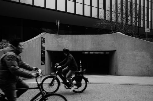 Free Dramatic urban cycling scene in Hasselt, Belgium, featuring motion blur. Stock Photo