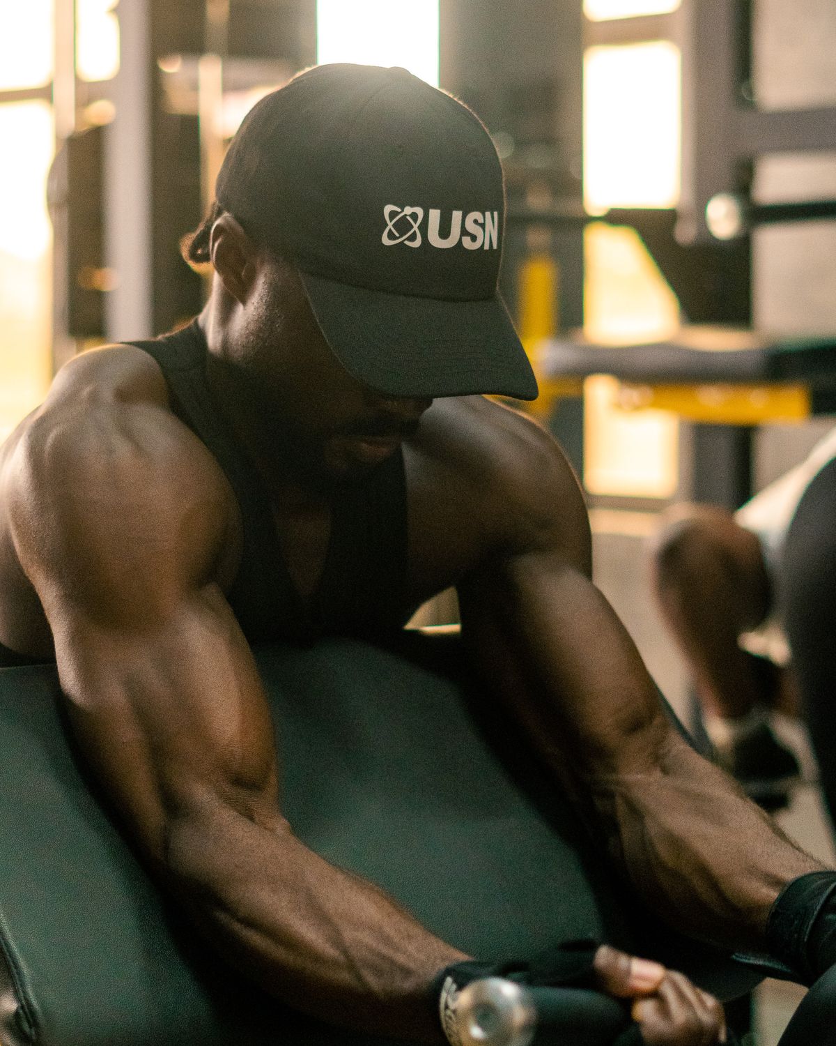 Rir and rpe explained: how hard should your gym sets be? | the gym pro Person Exercising With Dumbbells