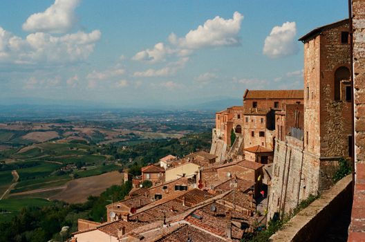 Breathtaking view over the rolling hills of Tuscany from a historic hilltop village.