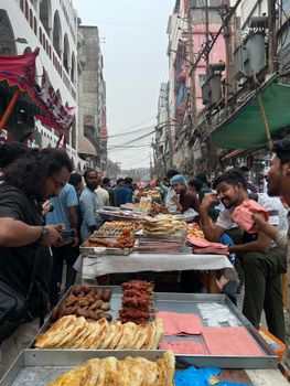 Lively street food market in Dhaka showcasing diverse culinary delights and local culture.