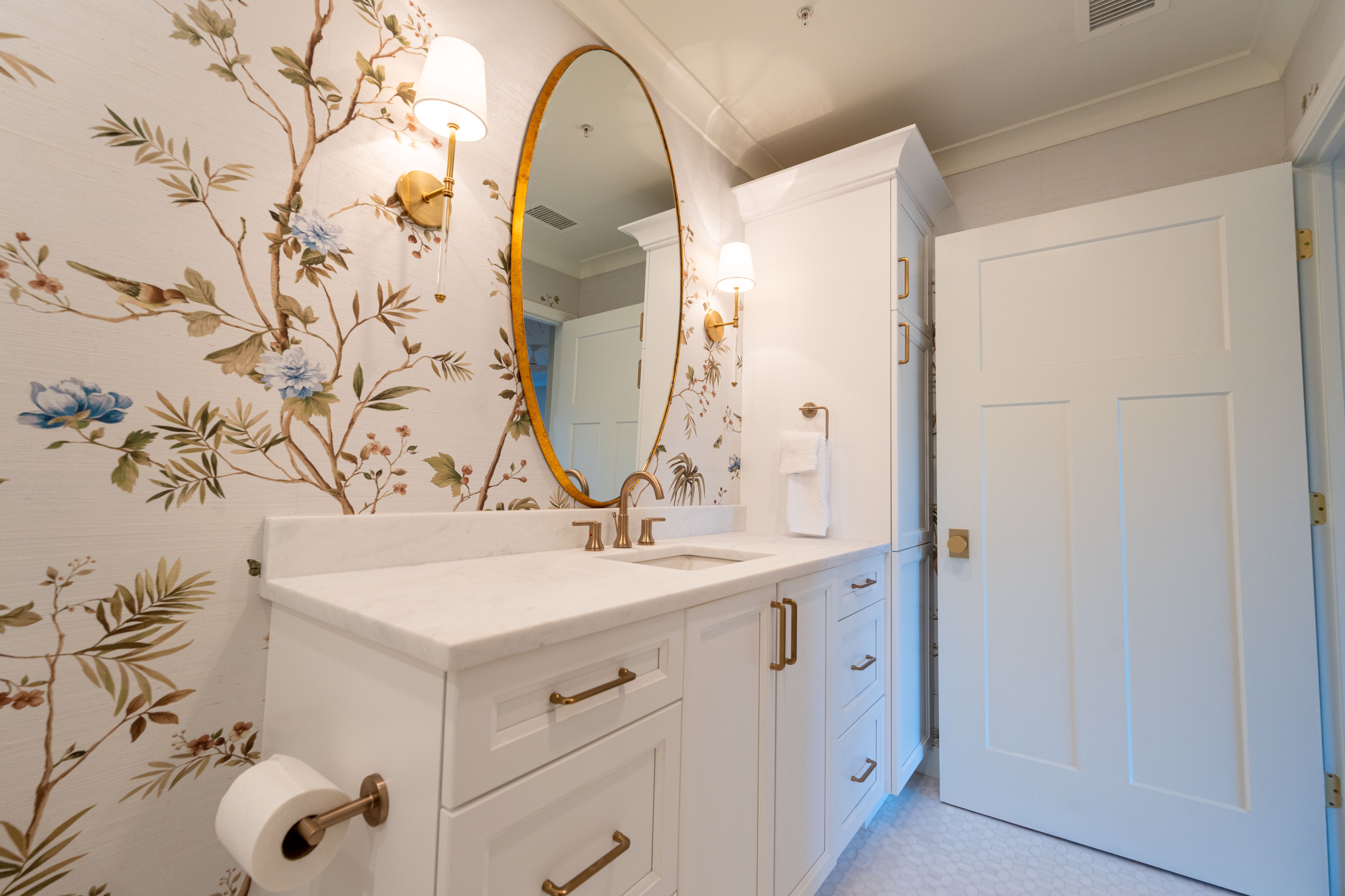 Wallpapering in Manor House — dust sheets down and the room fully protected