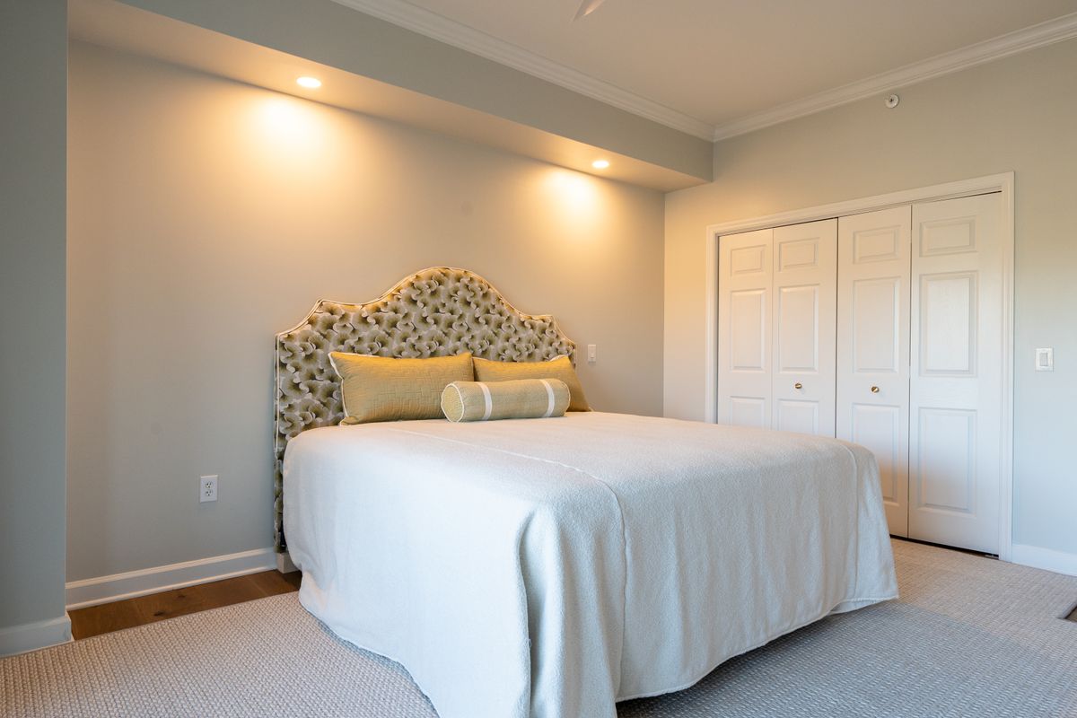 Elegant modern bed with a tufted headboard