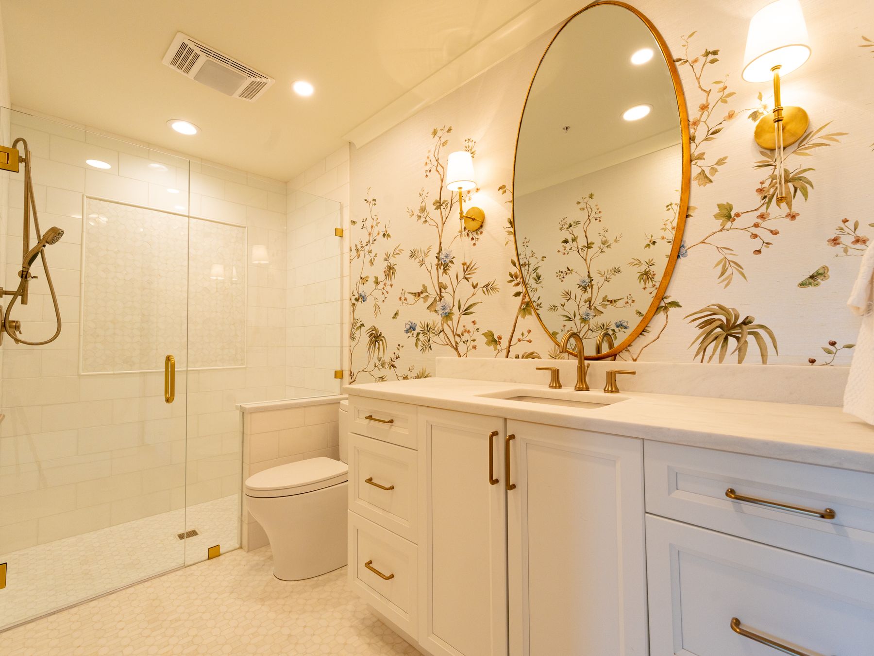 Wallpapering in Marks Gate — careful masking before painting begins