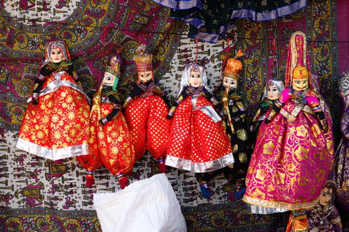 Free Colorful handmade Rajasthani puppets displayed in Jaipur's vibrant street market. Stock Photo