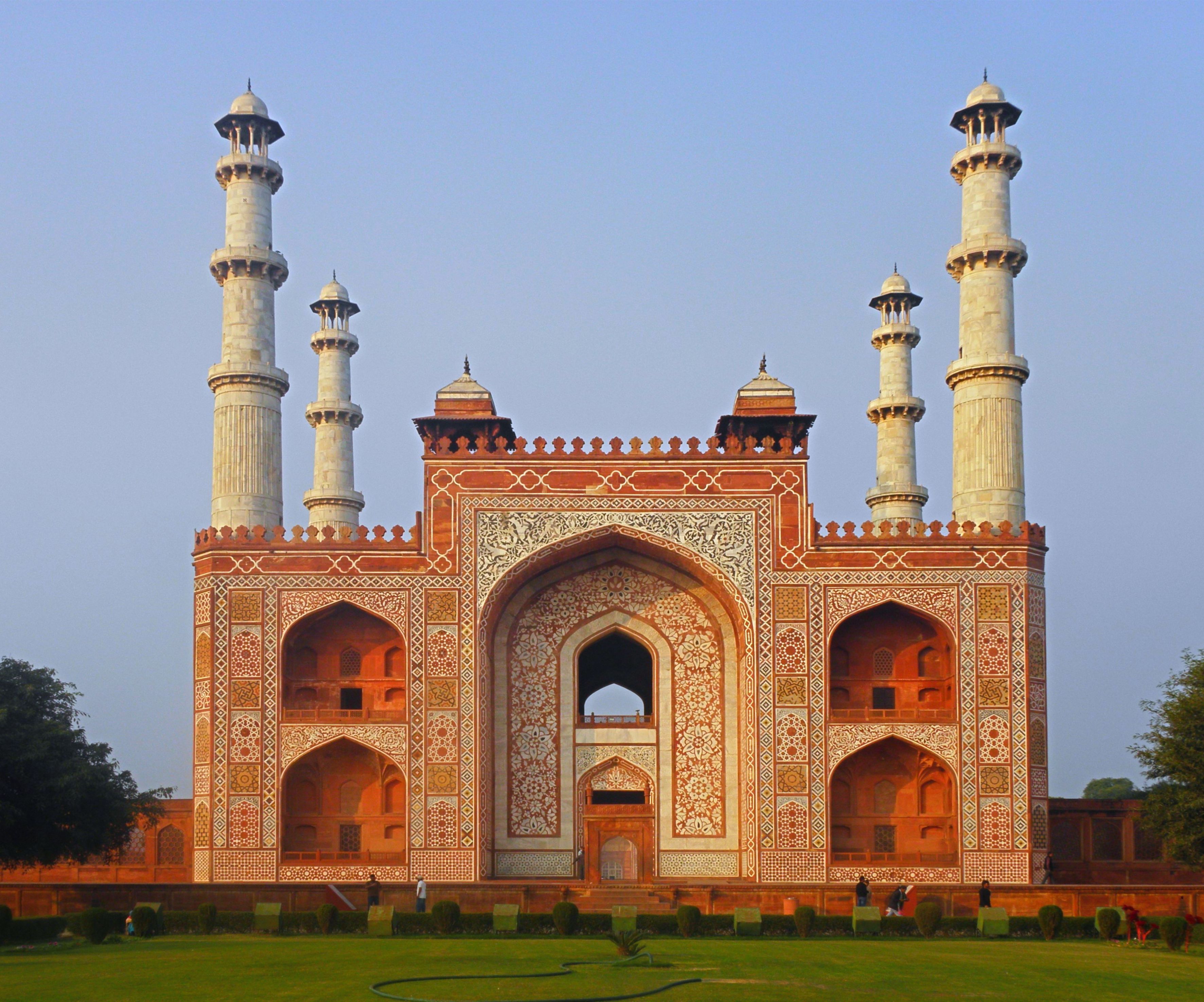 Majestic Mughal architecture of Akbar's Tomb in Agra, India, showcasing intricate design.