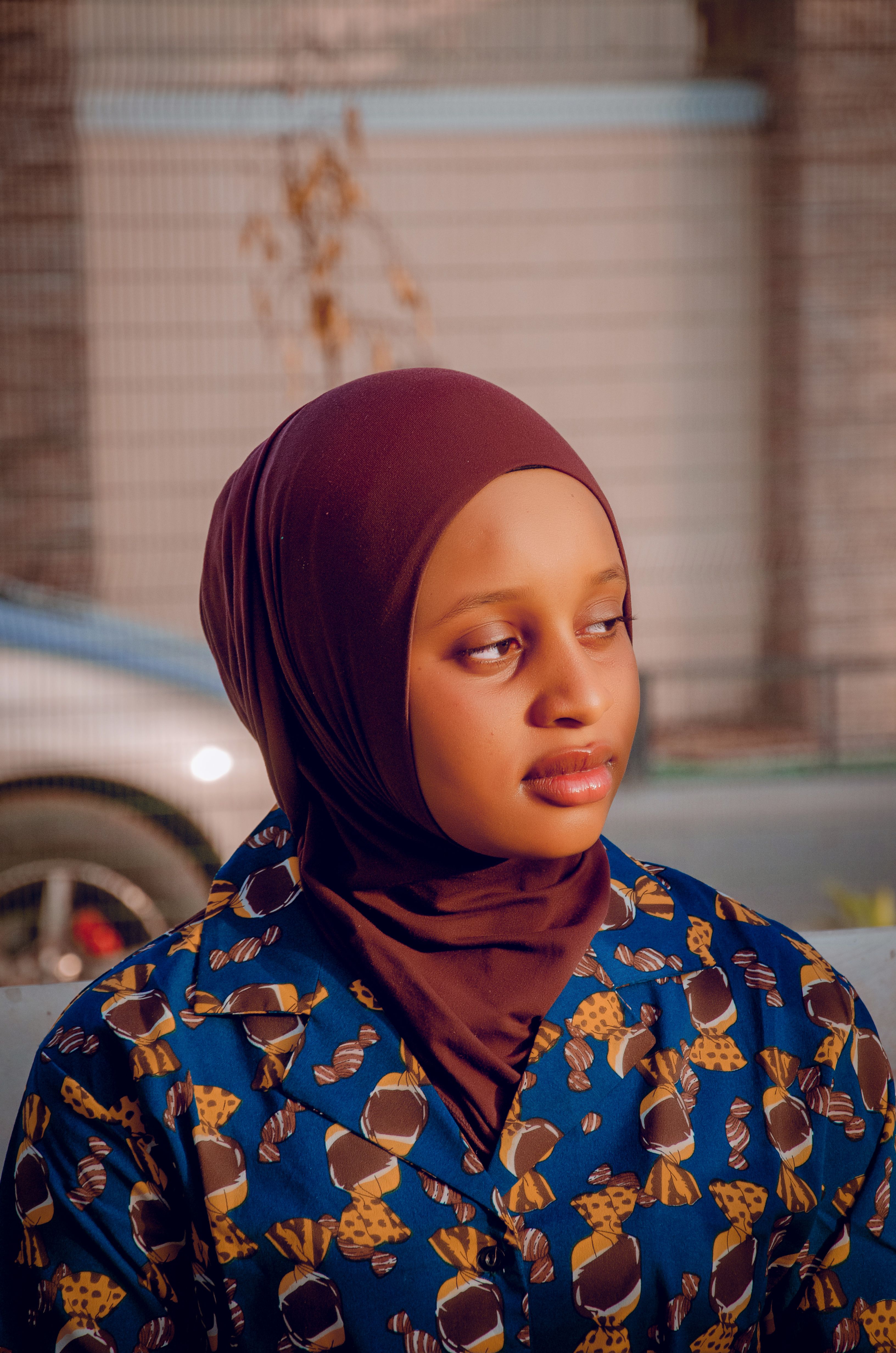 Thoughtful Portrait of Woman in Hijab with Patterned Dress · Free Stock ...