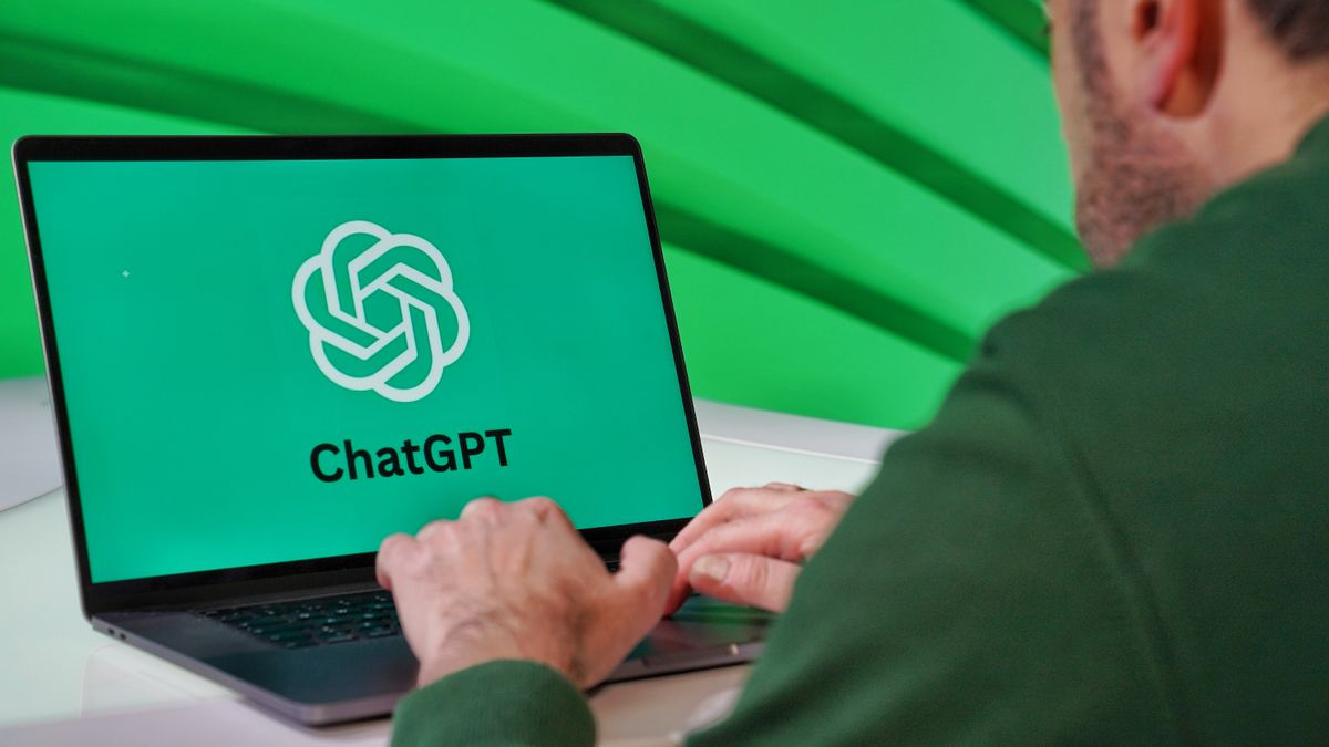 Person using ChatGPT on a laptop