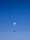 Black Power Line and Red Round Under Blue Sky