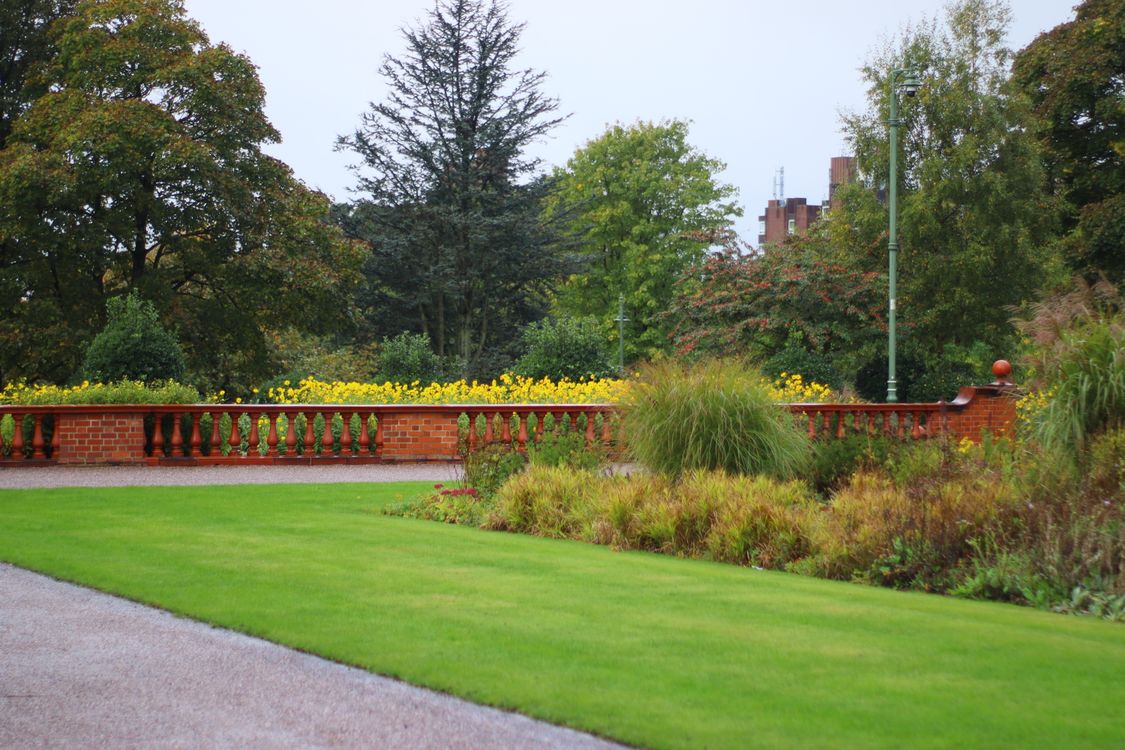 Beautiful UK garden with well-kept lawn, borders and hedges