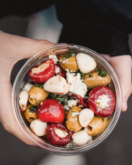 Photo Of Person Holding Bowl 