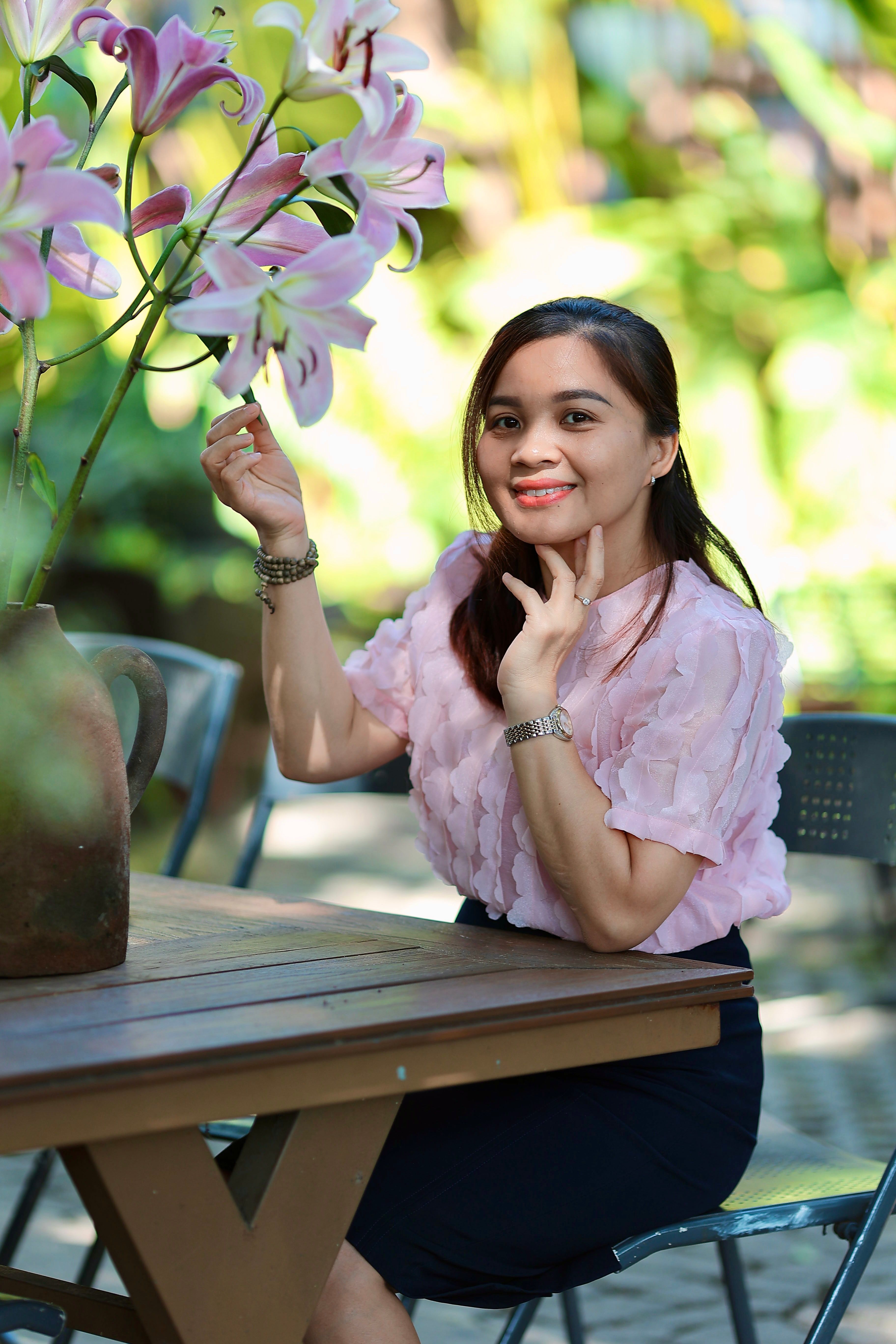 Smiling Woman Enjoying Summer Outdoors · Free Stock Photo