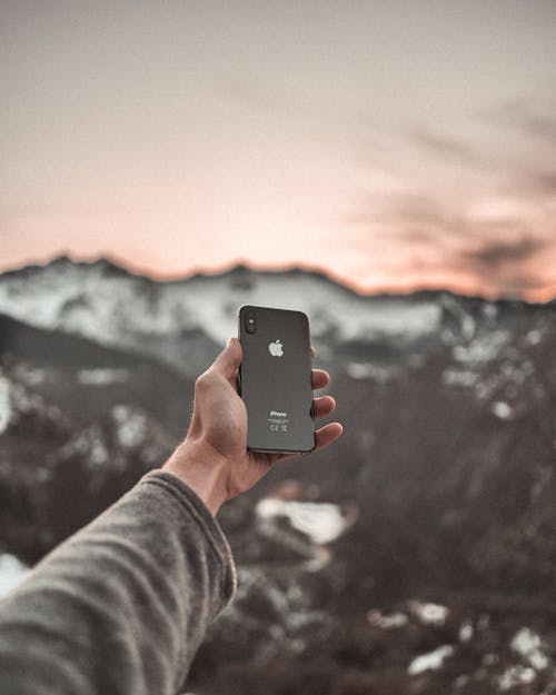 Free Person Holding Black iPhone Stock Photo