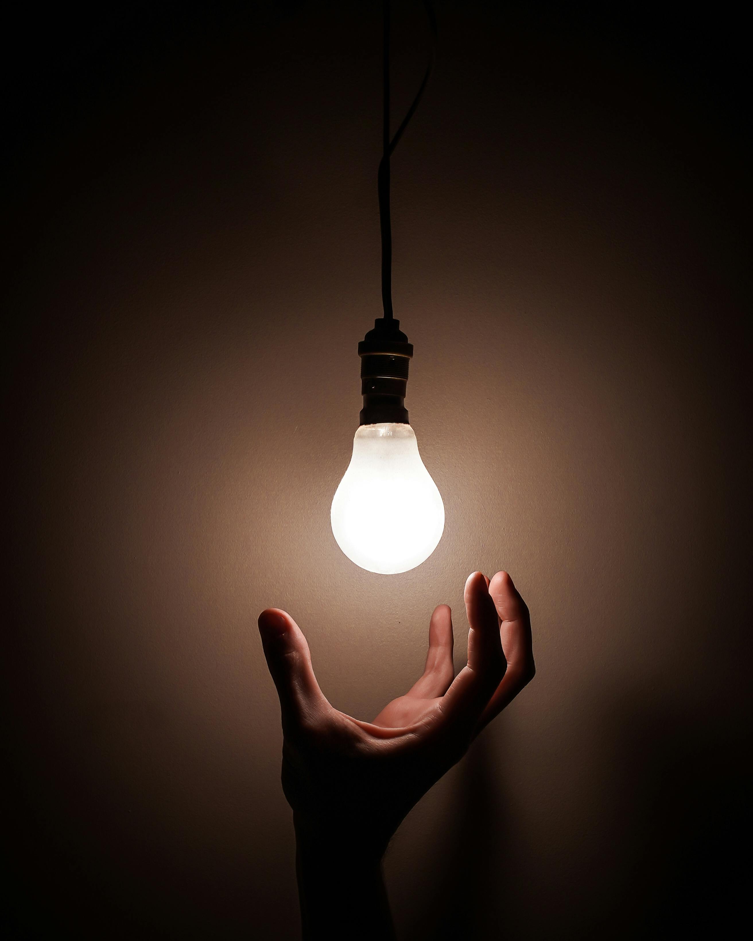 Premium Photo | Light bulb HD 8K wallpaper Stock Photographic Image