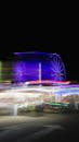 Vibrant Nighttime Carnival Ferris Wheel