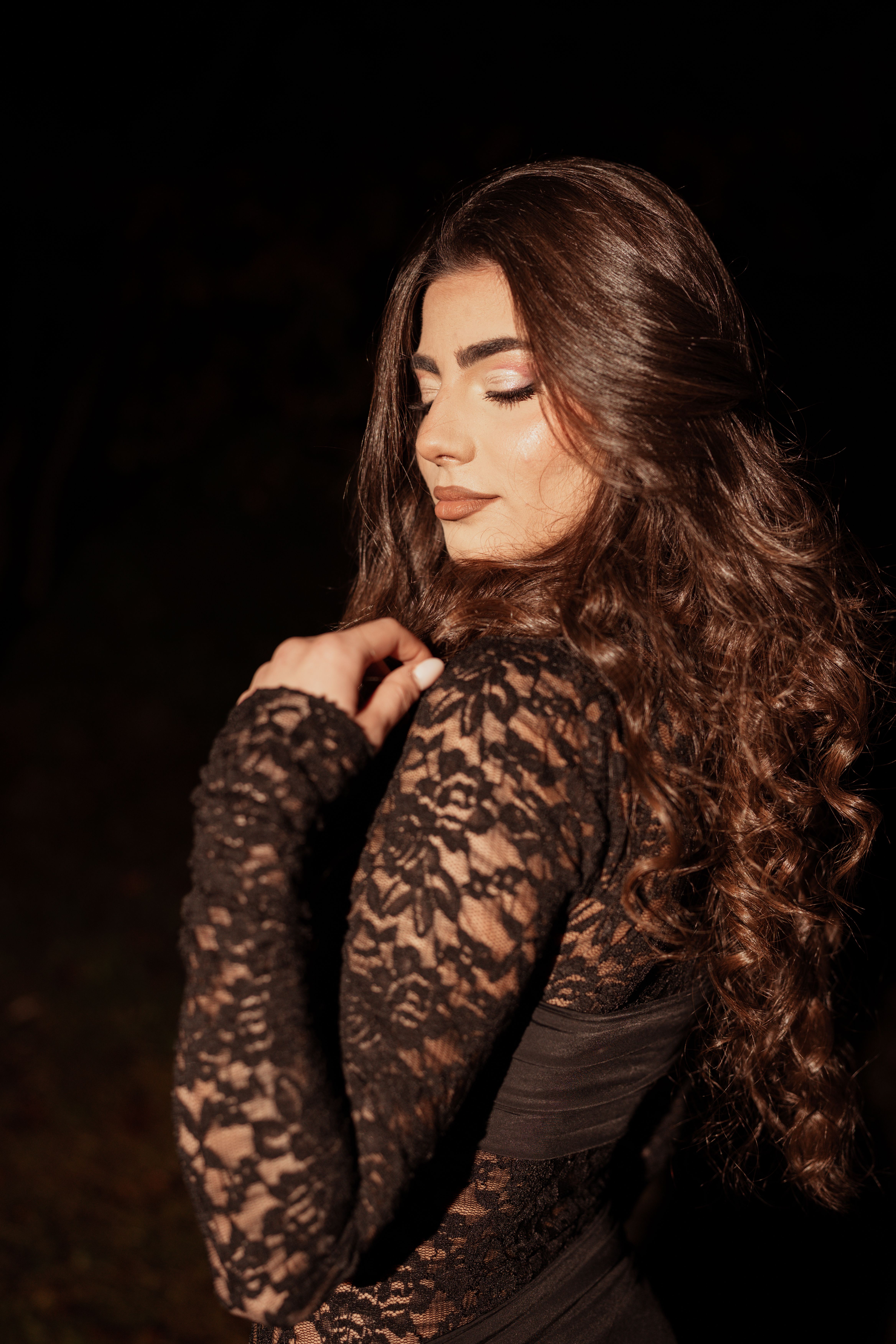 Elegant Woman in Black Lace Dress at Night · Free Stock Photo