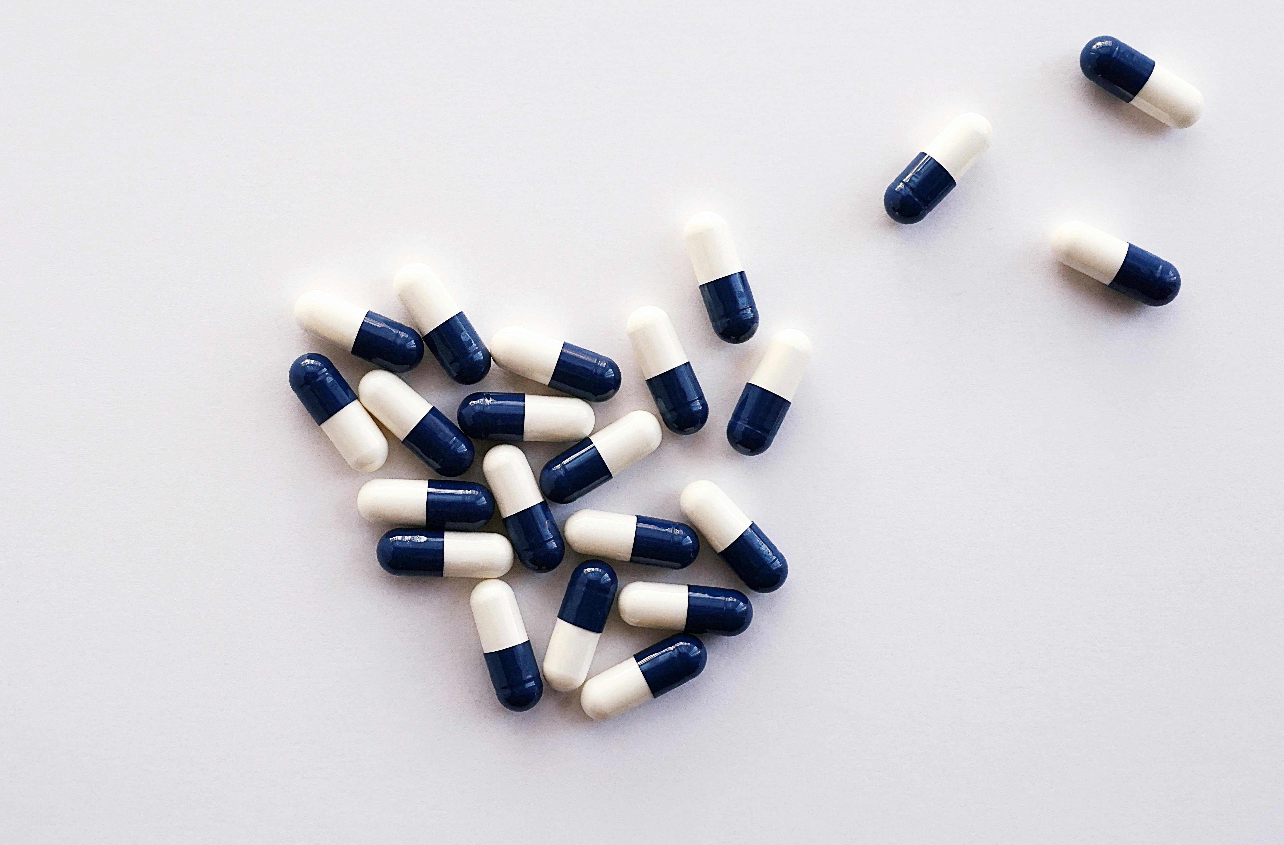 White and Blue Medication Pills \u00b7 Free Stock Photo