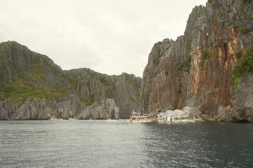 Free Explore the rugged limestone cliffs and tranquil waters of El Nido, a top travel destination in the Philippines. Stock Photo