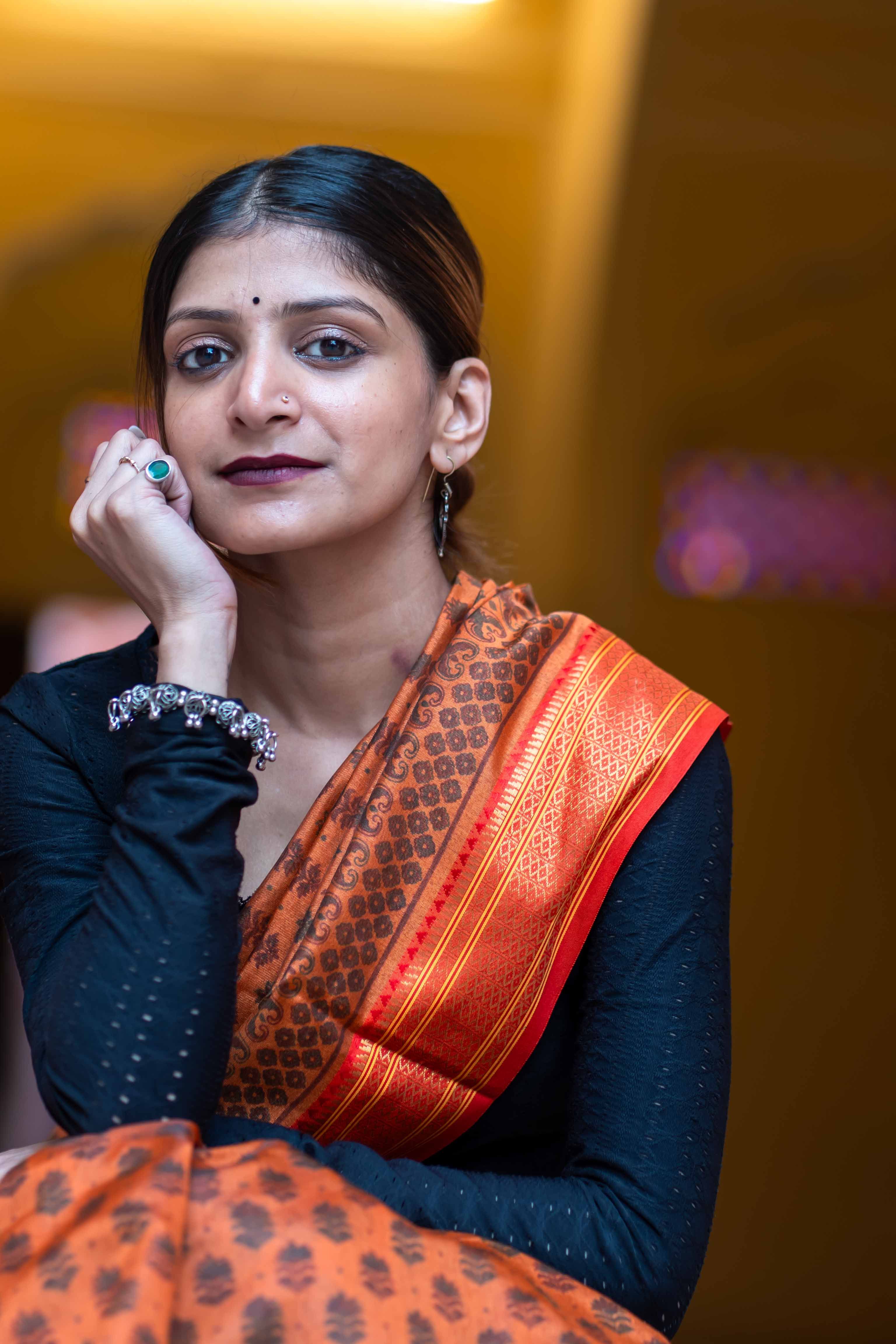 Elegant Woman in Traditional Indian Saree · Free Stock Photo