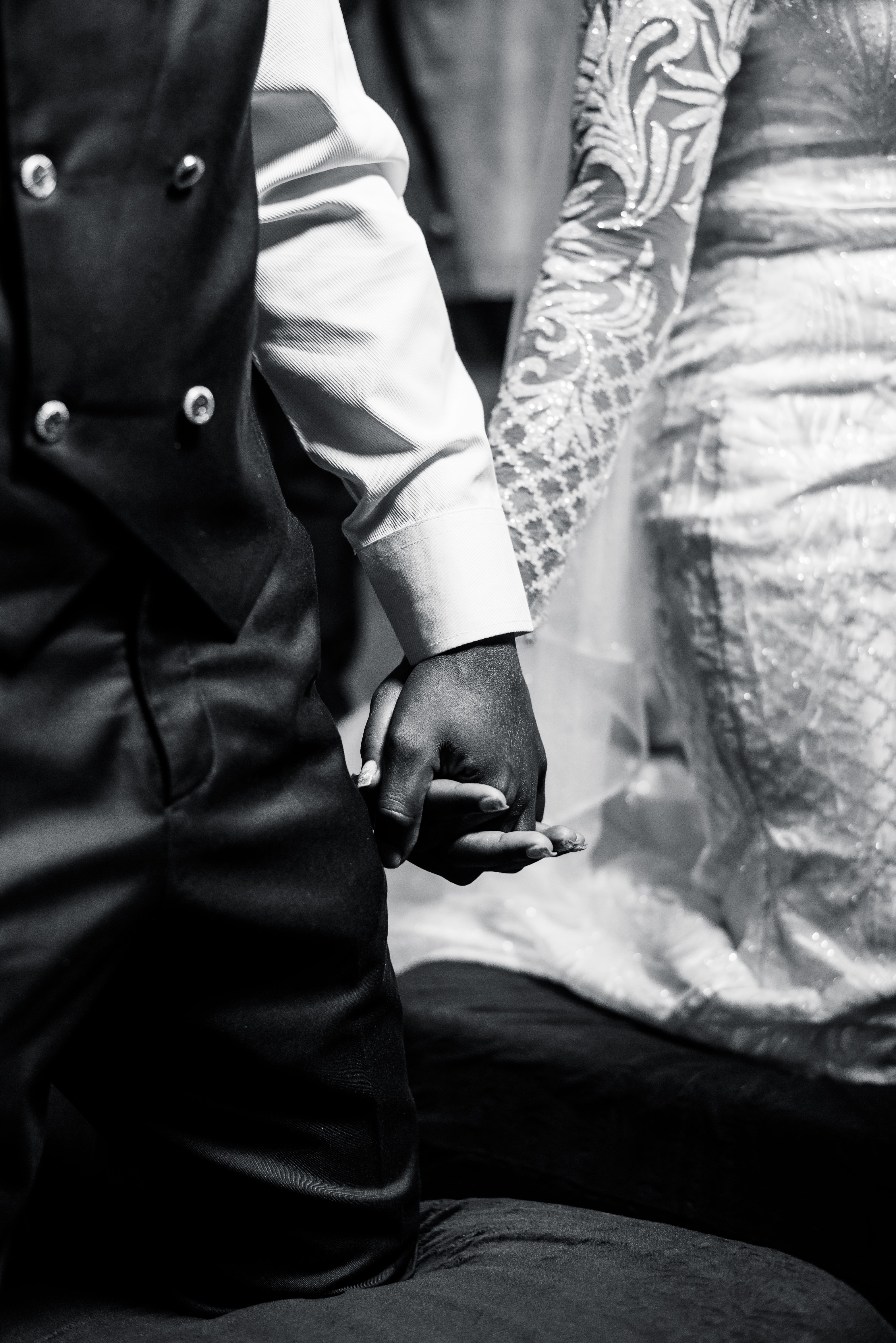 Black and White Wedding Couple Holding Hands · Free Stock Photo