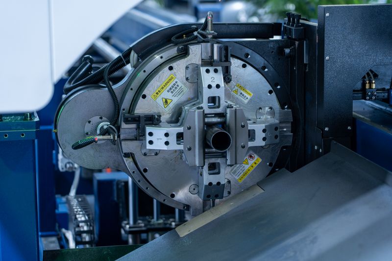 Close-up of a high-precision CNC machine in an industrial setting