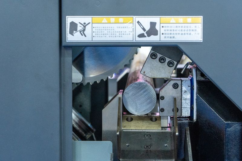 Detailed view of a metal cutting machine in operation