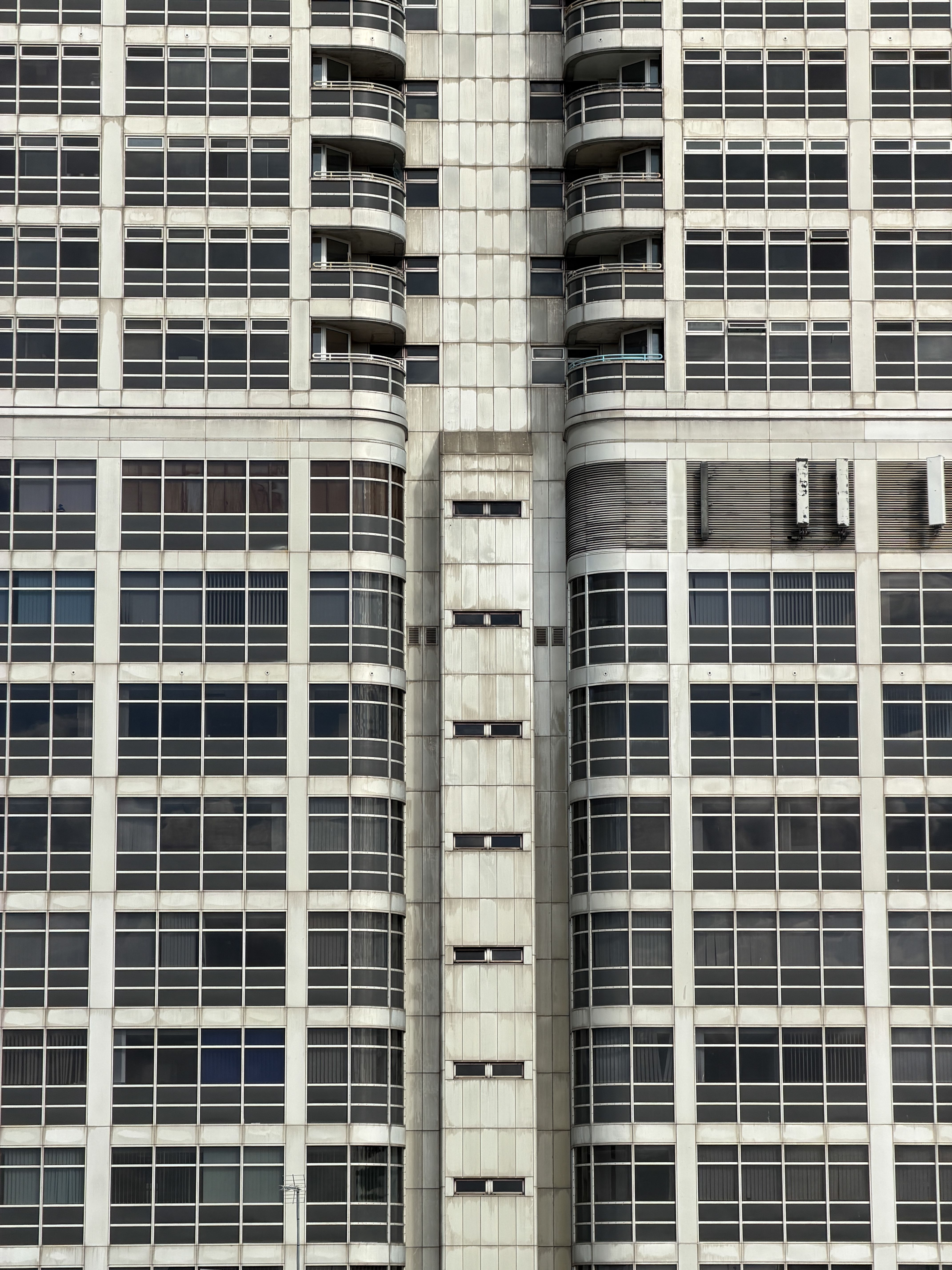 Symmetrical High-Rise Building Facade Architecture · Free Stock Photo