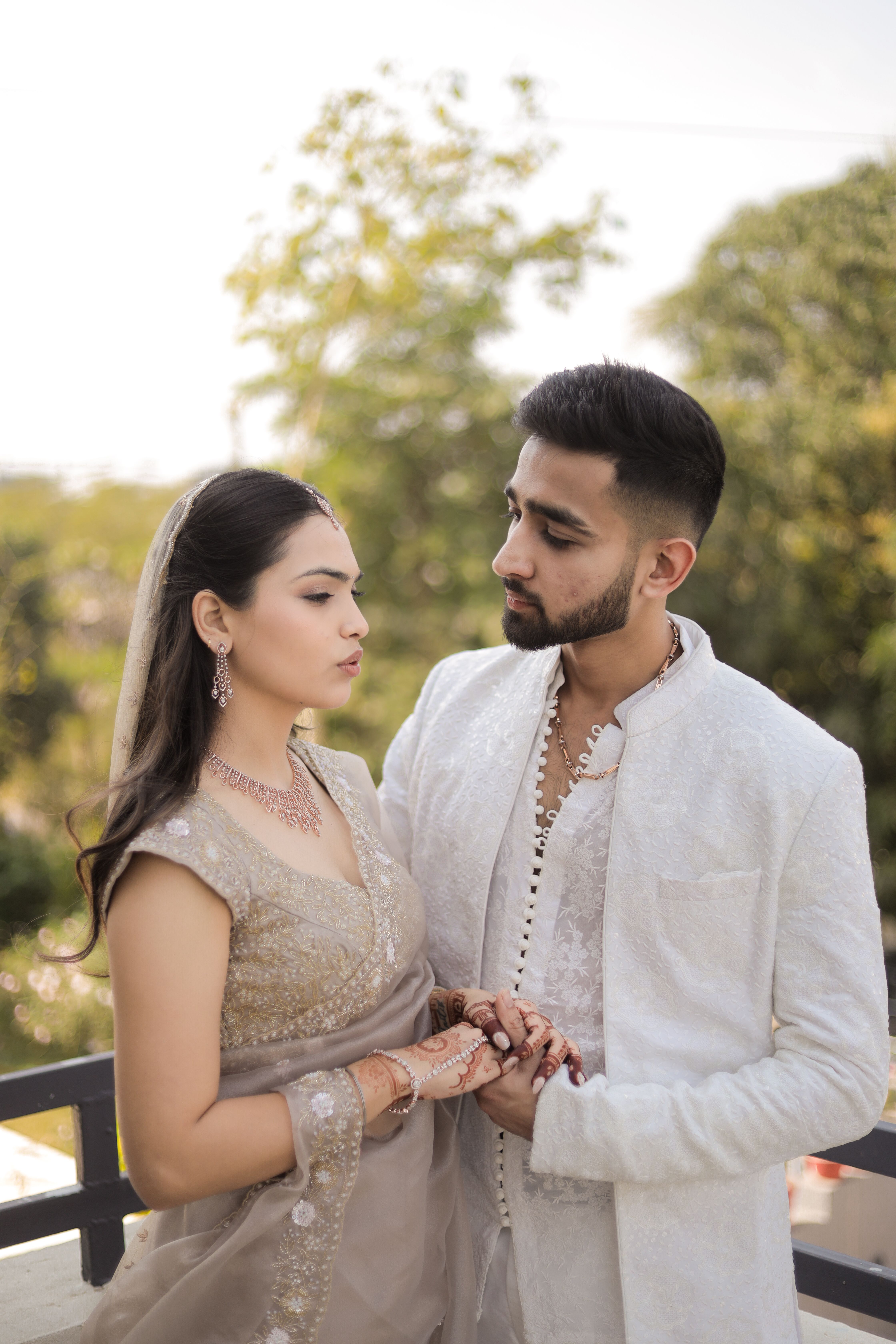 Elegant Indian Wedding Portrait of Couple Outdoors · Free Stock Photo