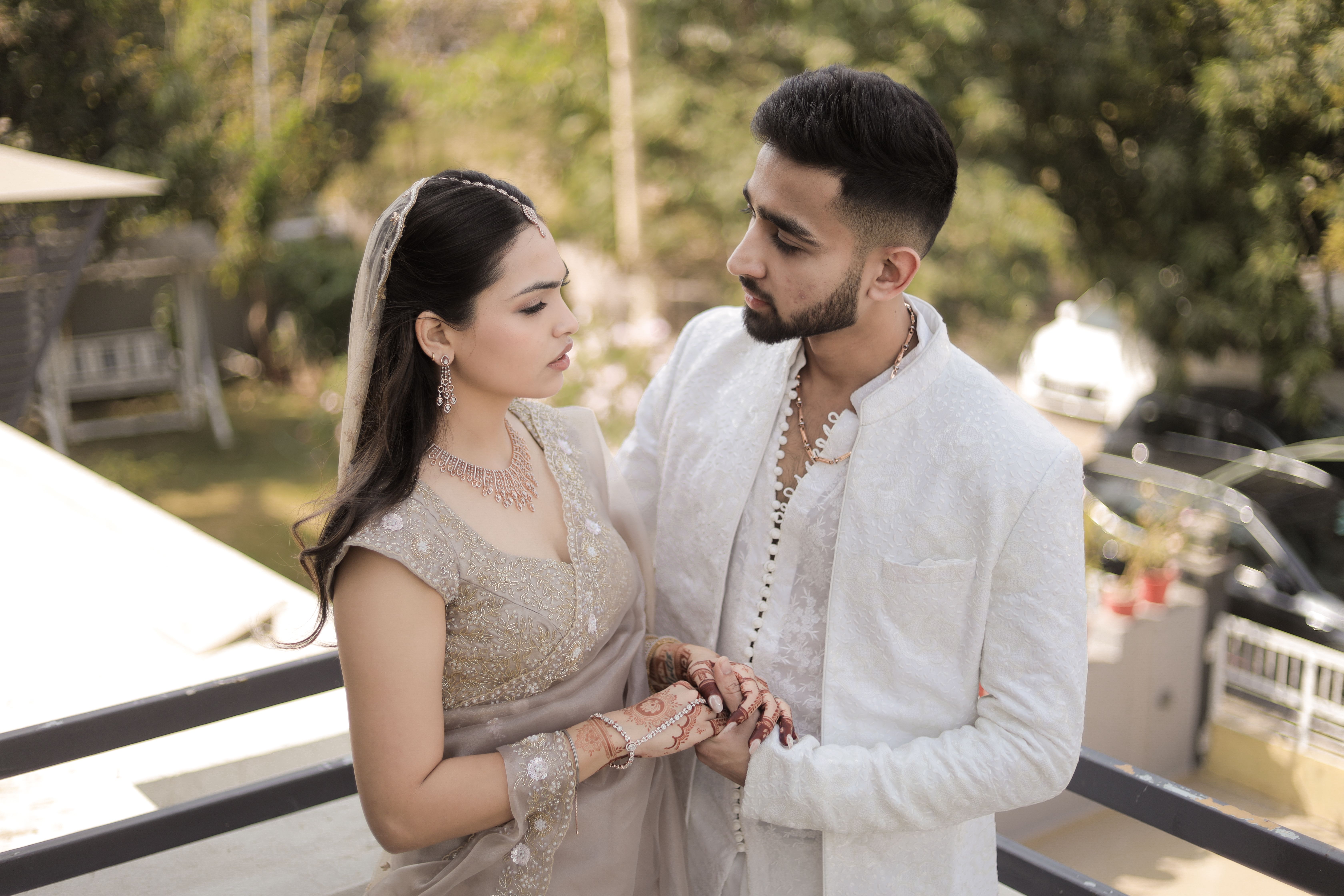 Elegant Indian Wedding Couple Portrait Outdoors · Free Stock Photo