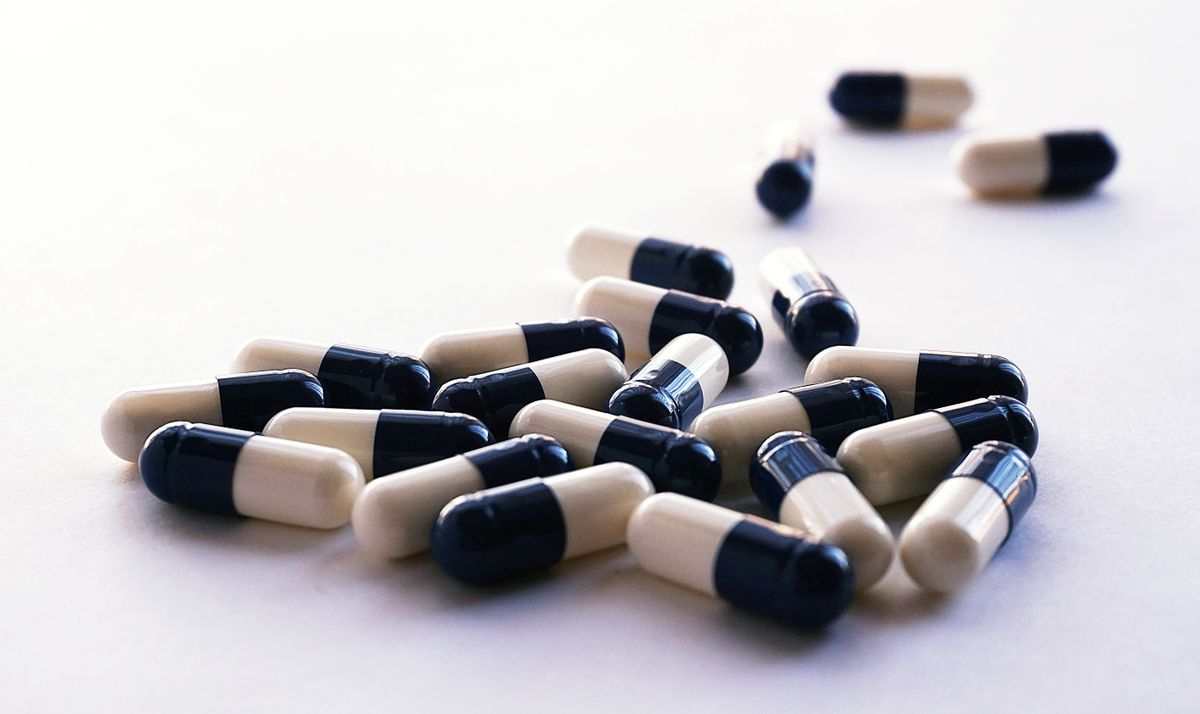 White and black antibiotic capsules