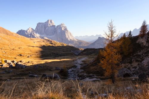 Free Scenic autumn view of the Dolomites in Veneto, Italy with golden trees. Stock Photo