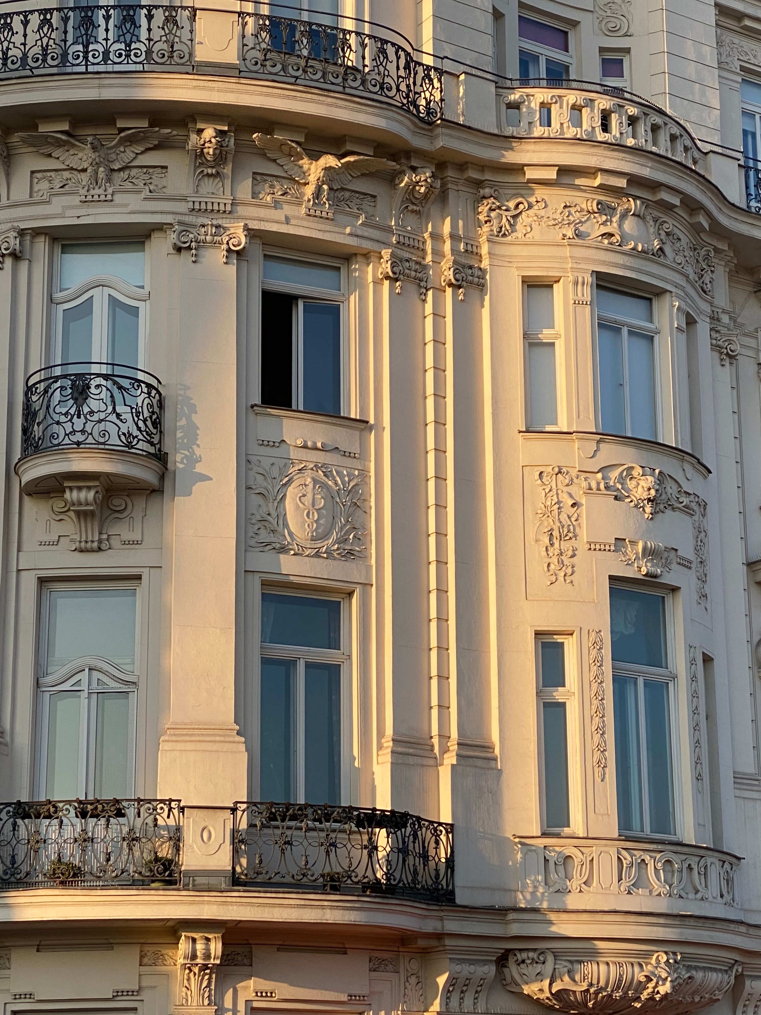 Ornate Art Nouveau architecture in Vienna with intricate details and ironwork.. ornate, nouveau, architecture