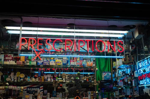 Free Prescriptions Sign On A Drug Store Front Stock Photo