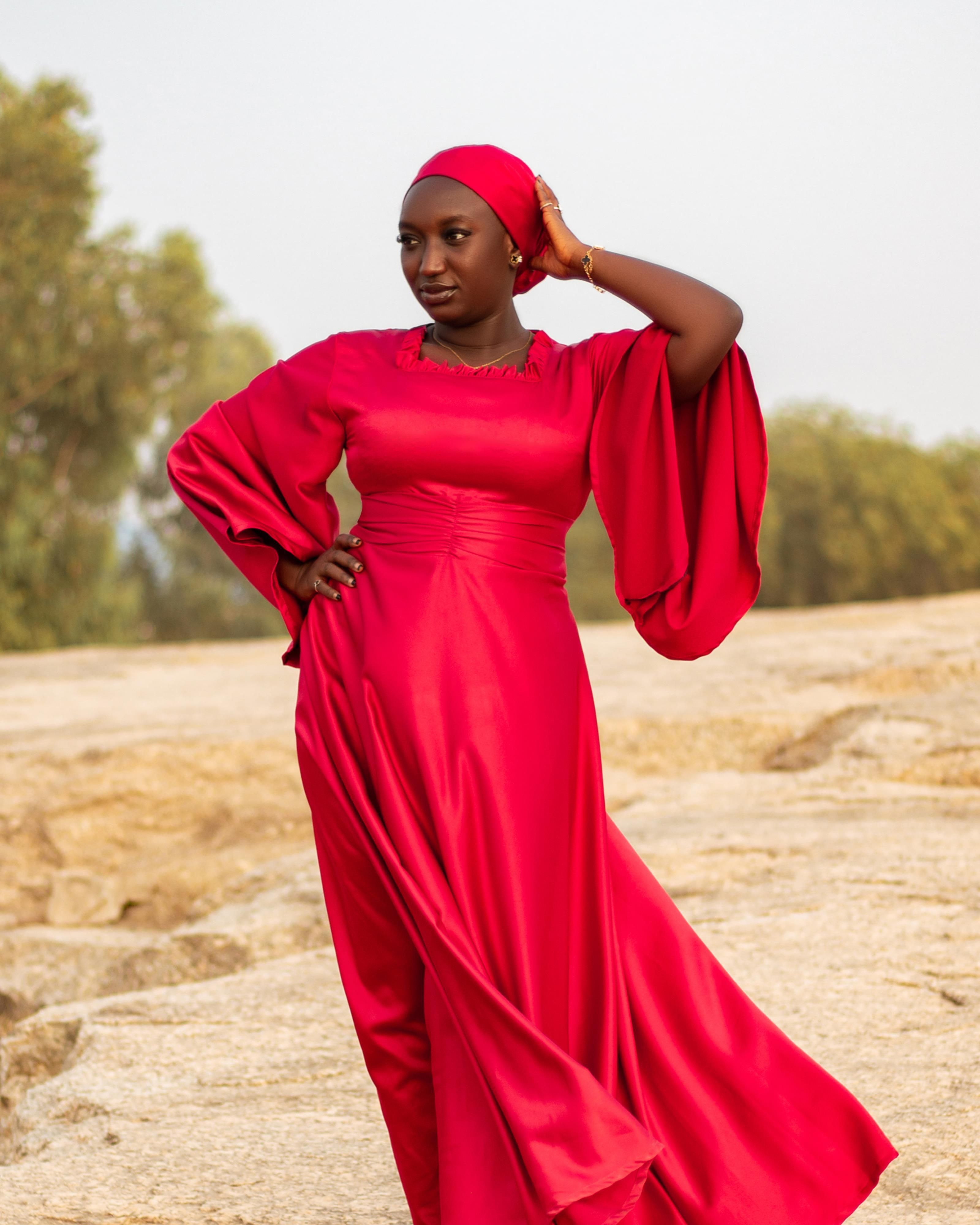 Elegant Woman in Red Dress Outdoors · Free Stock Photo