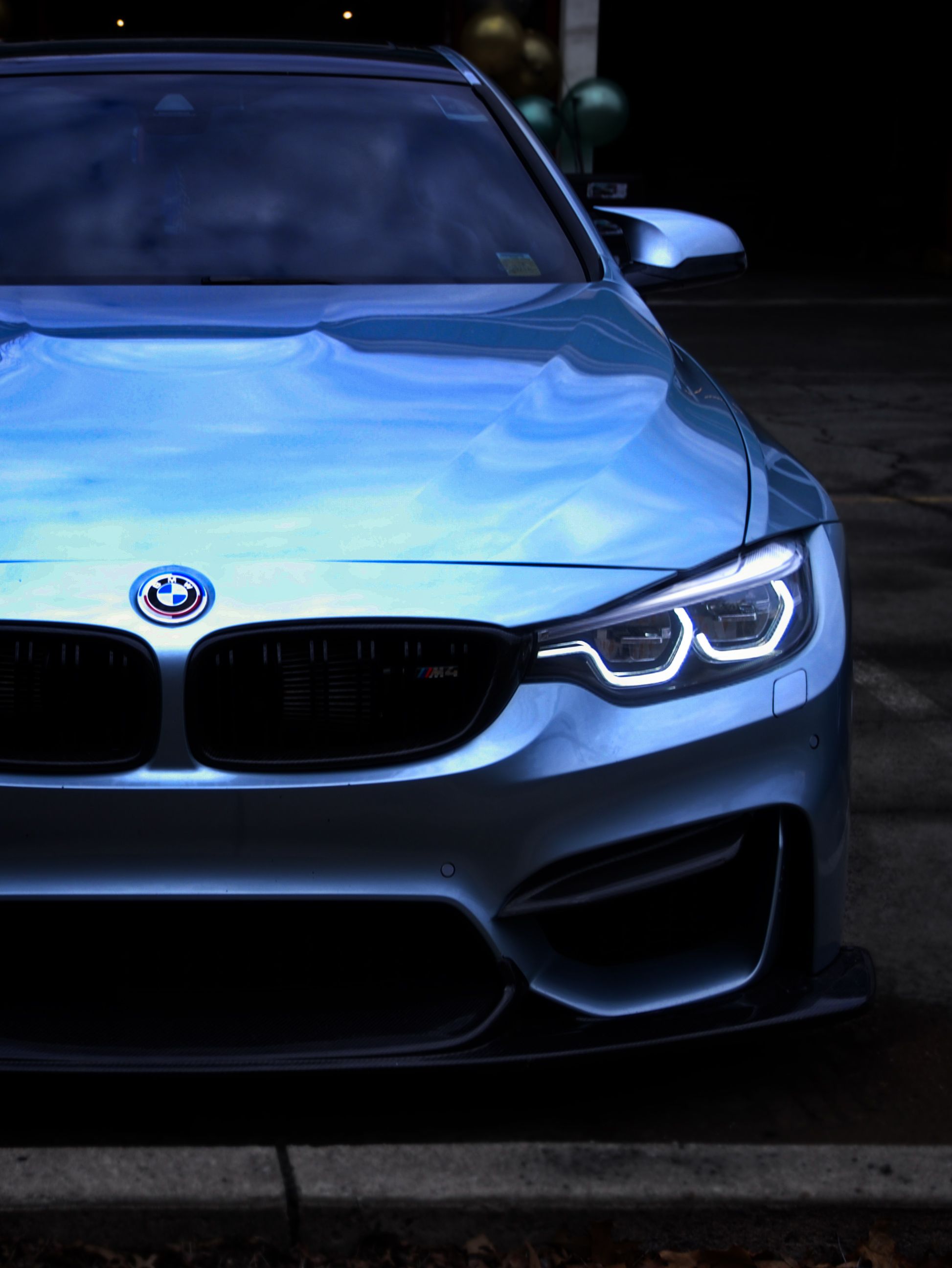 Sleek Front View of Luxury Car at Night · Free Stock Photo