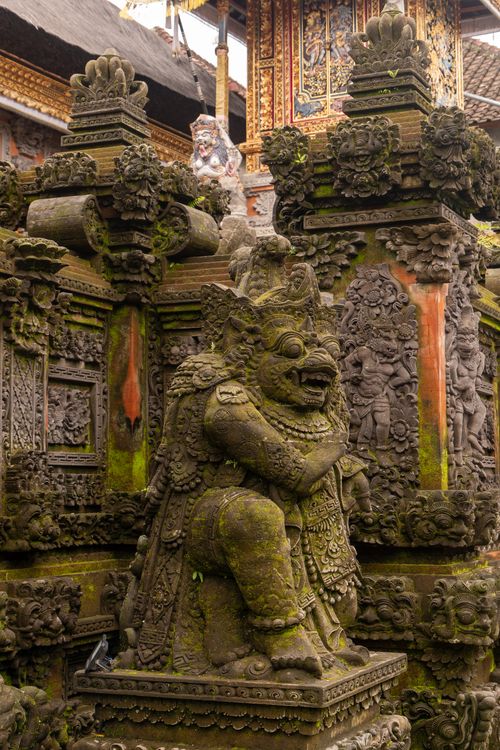 Free Ornate stone carving at a traditional Balinese temple in Ubud, showcasing intricate cultural art. Stock Photo
